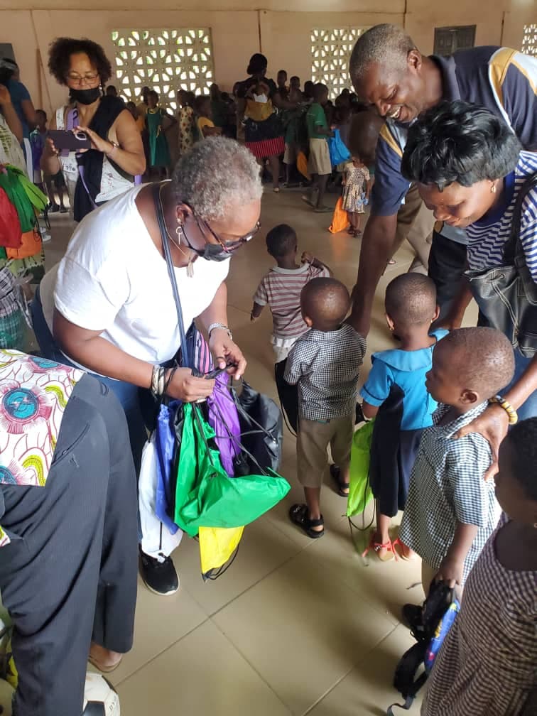 Students receiving their backpacks